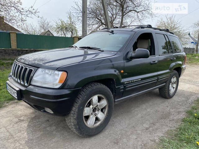 Сірий Джип Grand Cherokee, об'ємом двигуна 3.1 л та пробігом 260 тис. км за 5750 $, фото 2 на Automoto.ua