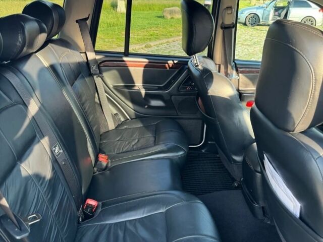Сірий Джип Grand Cherokee, об'ємом двигуна 2.7 л та пробігом 257 тис. км за 3100 $, фото 6 на Automoto.ua