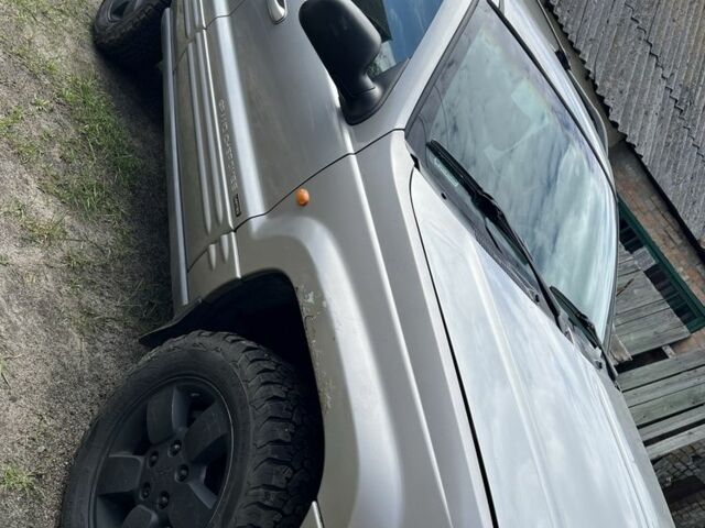 Серый Джип Гранд Чероки, объемом двигателя 3.1 л и пробегом 200 тыс. км за 3929 $, фото 4 на Automoto.ua