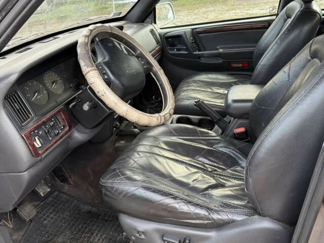Сірий Джип Grand Cherokee, об'ємом двигуна 2.5 л та пробігом 280 тис. км за 2700 $, фото 6 на Automoto.ua