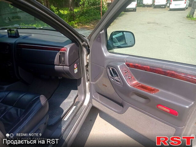 Сірий Джип Grand Cherokee, об'ємом двигуна 3.1 л та пробігом 240 тис. км за 5900 $, фото 4 на Automoto.ua