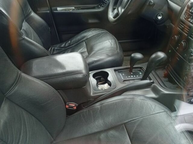 Серый Джип Гранд Чероки, объемом двигателя 3 л и пробегом 350 тыс. км за 1800 $, фото 4 на Automoto.ua