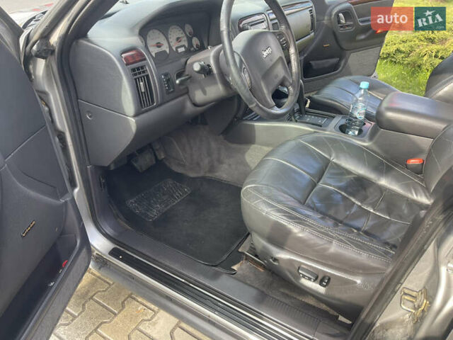 Сірий Джип Grand Cherokee, об'ємом двигуна 3.1 л та пробігом 315 тис. км за 4100 $, фото 5 на Automoto.ua
