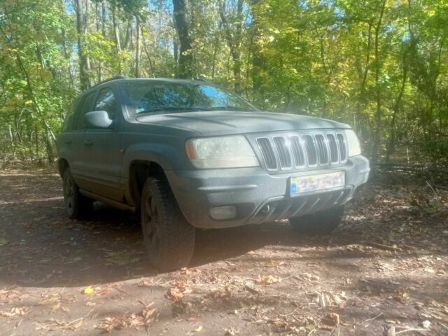 Серый Джип Гранд Чероки, объемом двигателя 3.1 л и пробегом 280 тыс. км за 4518 $, фото 1 на Automoto.ua