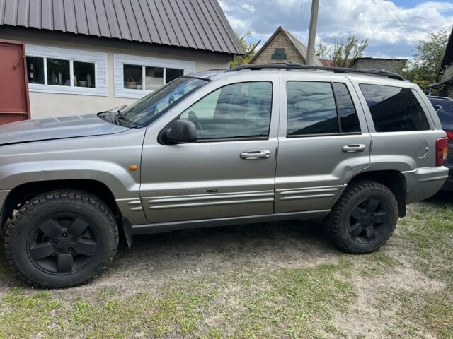 Сірий Джип Grand Cherokee, об'ємом двигуна 3.1 л та пробігом 200 тис. км за 4565 $, фото 1 на Automoto.ua
