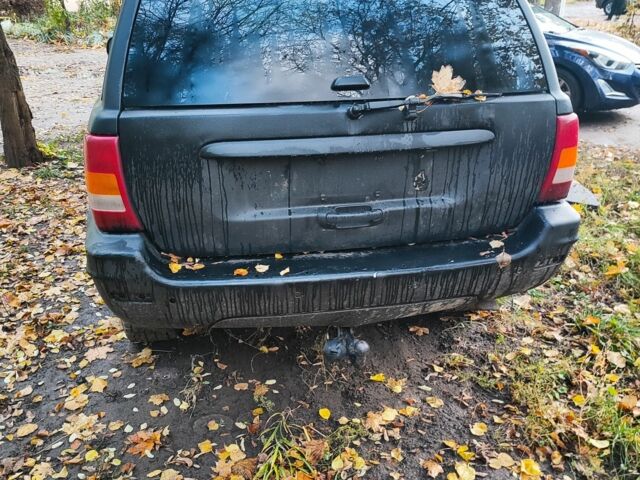 Сірий Джип Grand Cherokee, об'ємом двигуна 3 л та пробігом 268 тис. км за 3100 $, фото 2 на Automoto.ua