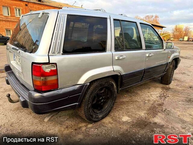 Сірий Джип Grand Cherokee, об'ємом двигуна 3 л та пробігом 280 тис. км за 3000 $, фото 2 на Automoto.ua