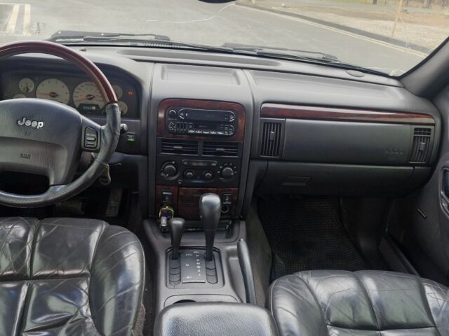 Сірий Джип Grand Cherokee, об'ємом двигуна 4.7 л та пробігом 321 тис. км за 6300 $, фото 7 на Automoto.ua