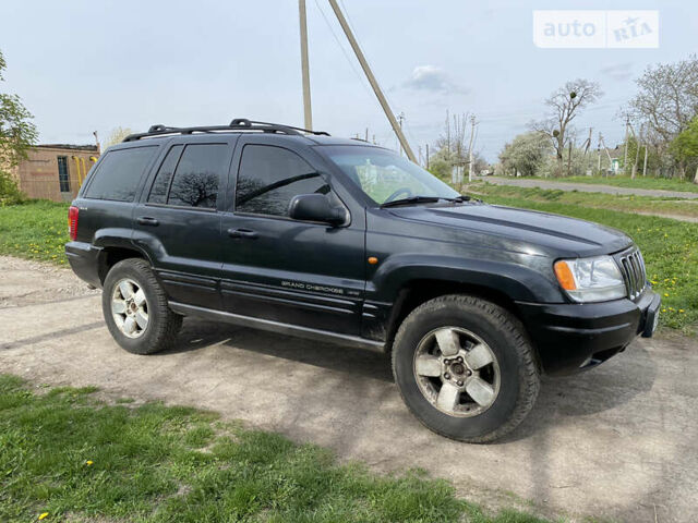 Сірий Джип Grand Cherokee, об'ємом двигуна 3.1 л та пробігом 260 тис. км за 5750 $, фото 9 на Automoto.ua