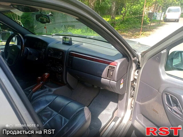 Сірий Джип Grand Cherokee, об'ємом двигуна 3.1 л та пробігом 240 тис. км за 5900 $, фото 5 на Automoto.ua