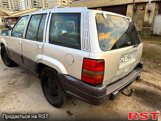 Сірий Джип Grand Cherokee, об'ємом двигуна 3 л та пробігом 280 тис. км за 3000 $, фото 5 на Automoto.ua