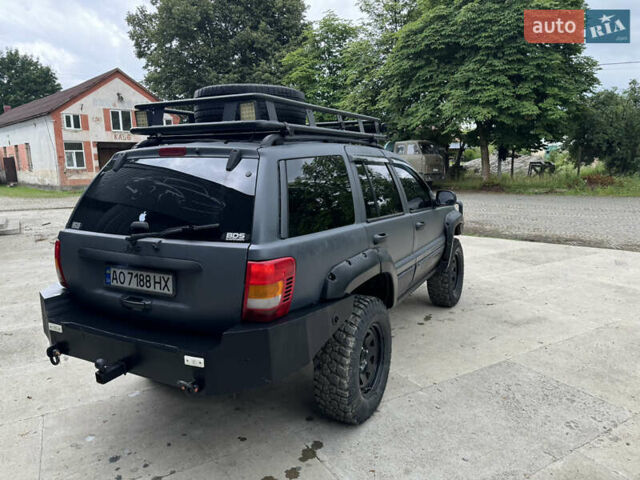 Сірий Джип Grand Cherokee, об'ємом двигуна 3.96 л та пробігом 166 тис. км за 11500 $, фото 5 на Automoto.ua