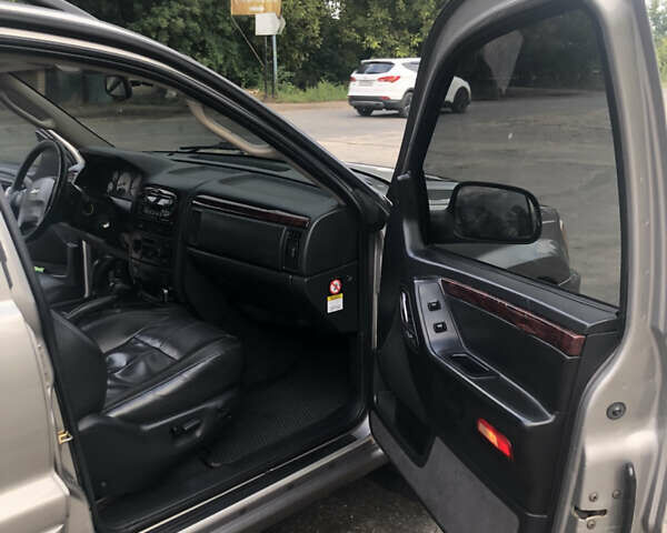 Серый Джип Гранд Чероки, объемом двигателя 2.69 л и пробегом 441 тыс. км за 9100 $, фото 9 на Automoto.ua