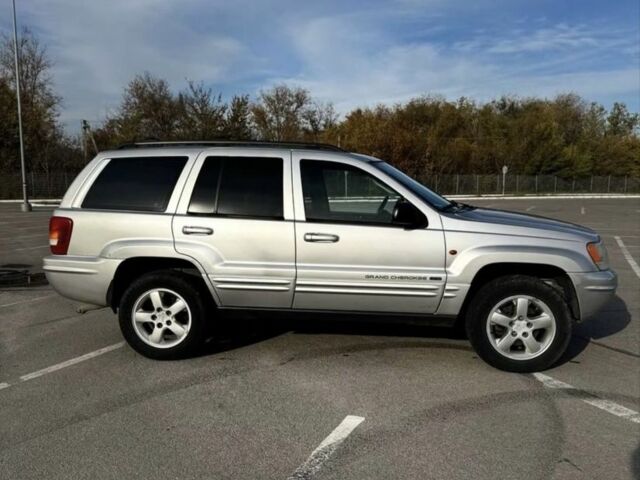 Сірий Джип Grand Cherokee, об'ємом двигуна 2.7 л та пробігом 380 тис. км за 7300 $, фото 3 на Automoto.ua