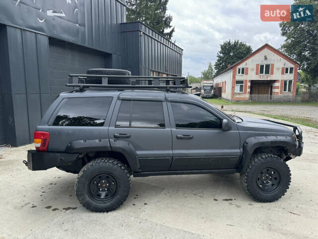 Сірий Джип Grand Cherokee, об'ємом двигуна 3.96 л та пробігом 166 тис. км за 11500 $, фото 3 на Automoto.ua