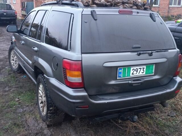 Серый Джип Гранд Чероки, объемом двигателя 2 л и пробегом 298 тыс. км за 5200 $, фото 2 на Automoto.ua