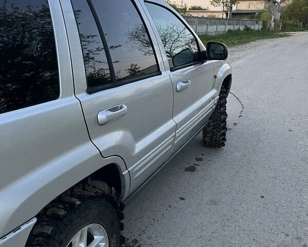 Сірий Джип Grand Cherokee, об'ємом двигуна 2.69 л та пробігом 250 тис. км за 9700 $, фото 6 на Automoto.ua