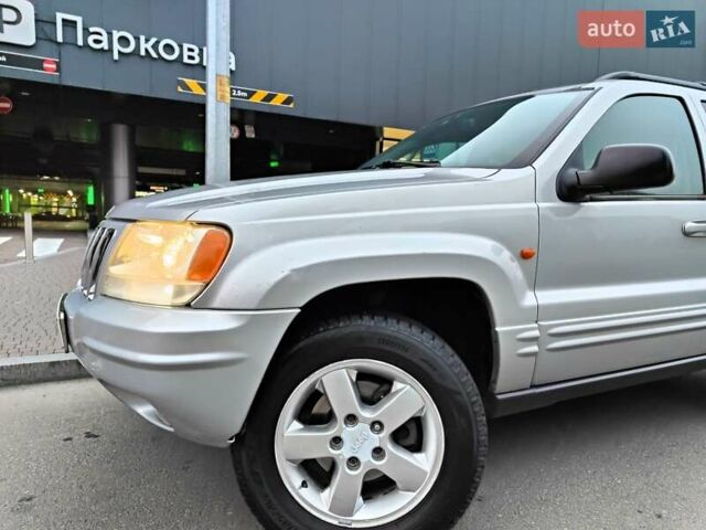 Сірий Джип Grand Cherokee, об'ємом двигуна 2.7 л та пробігом 387 тис. км за 6990 $, фото 3 на Automoto.ua