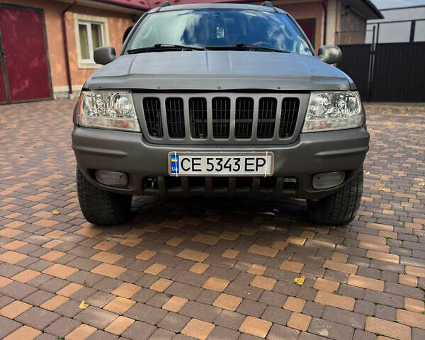 Джип Гранд Чероки 2002 в Сторожинце на Automoto.ua Серый Джип Гранд Чероки, объемом двигателя 2.69 л и пробегом 248 тыс. км за 8990 $, фото 1 на Automoto.ua