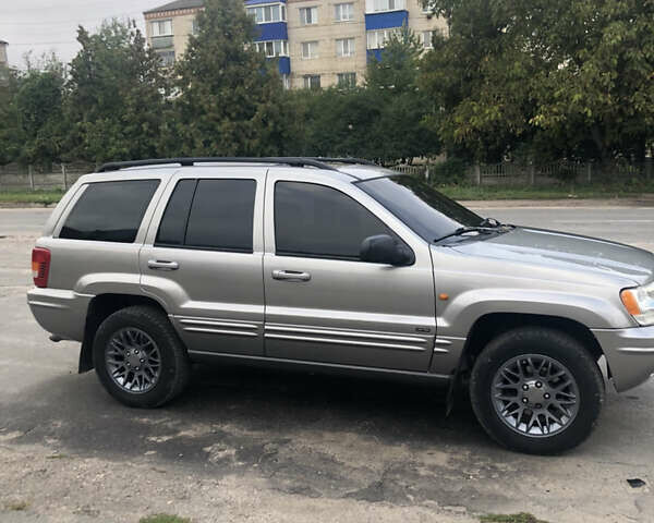Серый Джип Гранд Чероки, объемом двигателя 2.69 л и пробегом 441 тыс. км за 9100 $, фото 3 на Automoto.ua