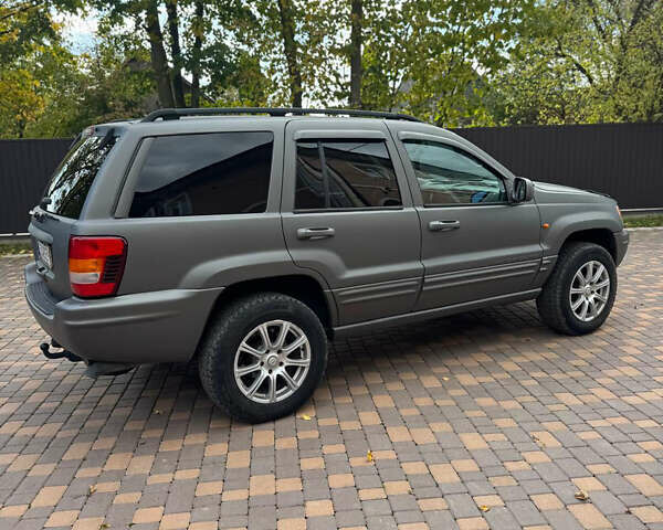 Джип Гранд Чероки 2002 в Сторожинце на Automoto.ua Серый Джип Гранд Чероки, объемом двигателя 2.69 л и пробегом 248 тыс. км за 8990 $, фото 3 на Automoto.ua