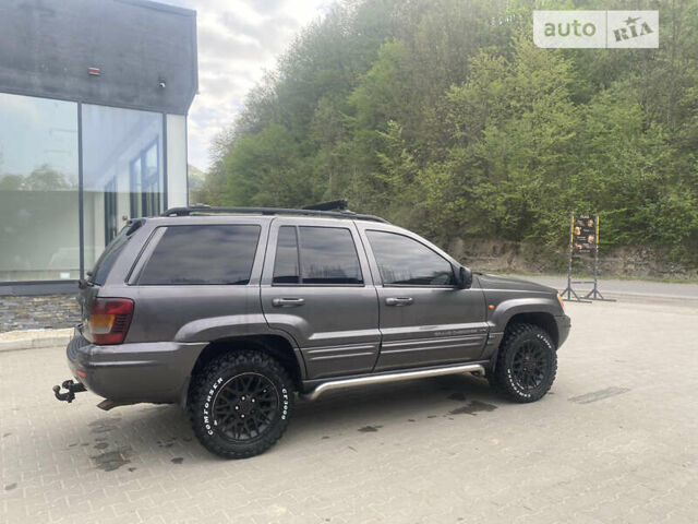 Сірий Джип Grand Cherokee, об'ємом двигуна 2.69 л та пробігом 215 тис. км за 8300 $, фото 6 на Automoto.ua