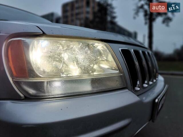 Сірий Джип Grand Cherokee, об'ємом двигуна 2.7 л та пробігом 387 тис. км за 6990 $, фото 25 на Automoto.ua