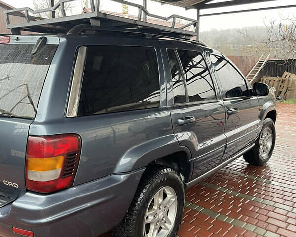 Серый Джип Гранд Чероки, объемом двигателя 2.7 л и пробегом 231 тыс. км за 9500 $, фото 12 на Automoto.ua