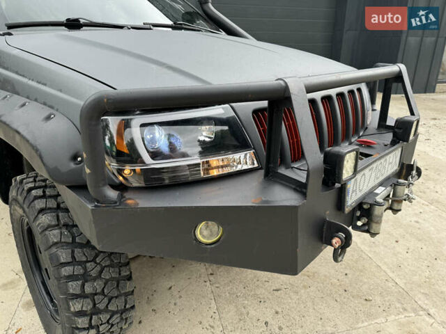 Сірий Джип Grand Cherokee, об'ємом двигуна 3.96 л та пробігом 166 тис. км за 11500 $, фото 13 на Automoto.ua