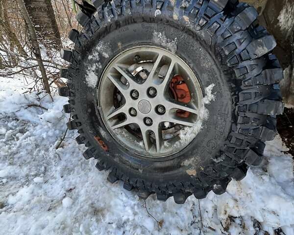 Сірий Джип Grand Cherokee, об'ємом двигуна 4.7 л та пробігом 100 тис. км за 12000 $, фото 4 на Automoto.ua