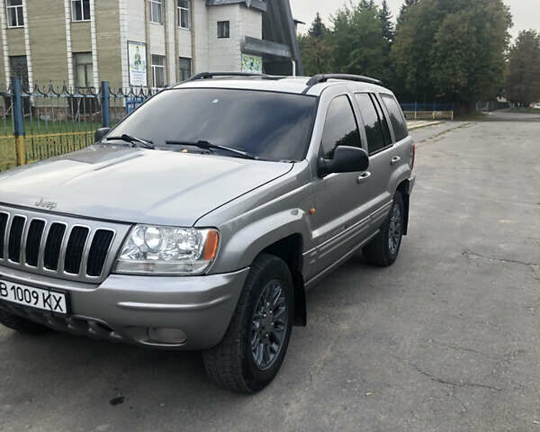 Серый Джип Гранд Чероки, объемом двигателя 2.69 л и пробегом 441 тыс. км за 9100 $, фото 1 на Automoto.ua