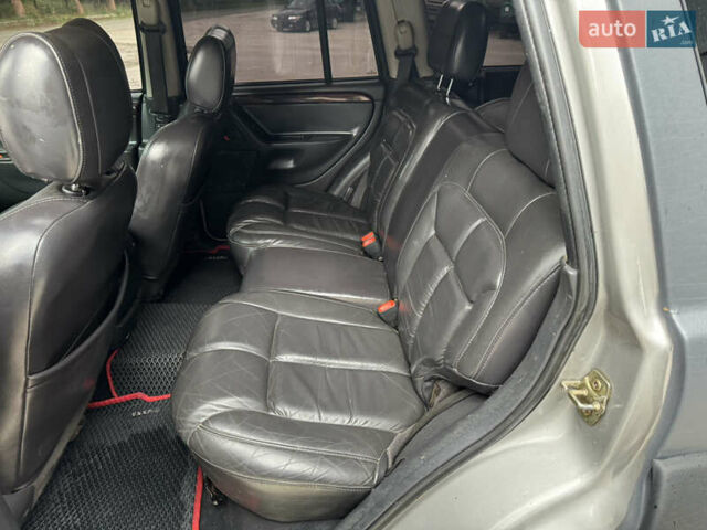 Сірий Джип Grand Cherokee, об'ємом двигуна 3.96 л та пробігом 166 тис. км за 11500 $, фото 18 на Automoto.ua