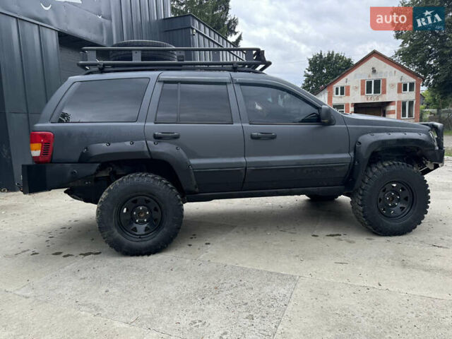 Сірий Джип Grand Cherokee, об'ємом двигуна 3.96 л та пробігом 166 тис. км за 11500 $, фото 2 на Automoto.ua