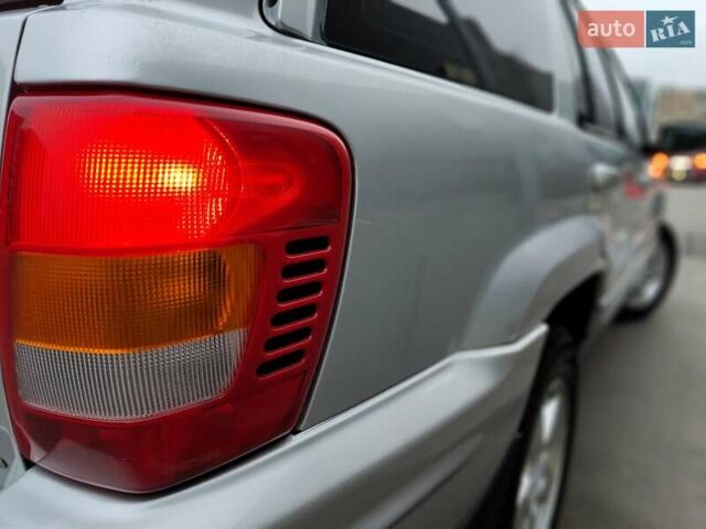 Сірий Джип Grand Cherokee, об'ємом двигуна 2.7 л та пробігом 387 тис. км за 6990 $, фото 15 на Automoto.ua