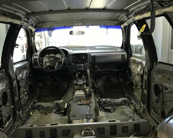 Сірий Джип Grand Cherokee, об'ємом двигуна 2.69 л та пробігом 359 тис. км за 11000 $, фото 35 на Automoto.ua