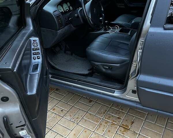 Сірий Джип Grand Cherokee, об'ємом двигуна 2.69 л та пробігом 359 тис. км за 11000 $, фото 13 на Automoto.ua