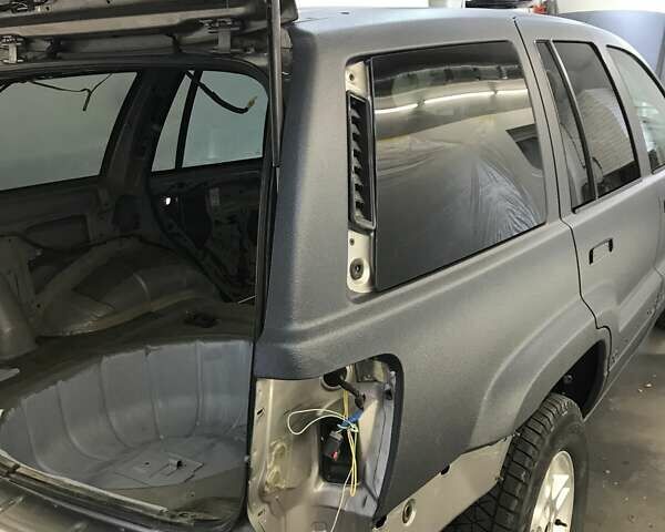 Сірий Джип Grand Cherokee, об'ємом двигуна 2.69 л та пробігом 359 тис. км за 11000 $, фото 36 на Automoto.ua