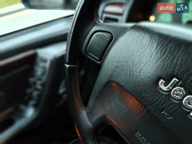 Сірий Джип Grand Cherokee, об'ємом двигуна 2.7 л та пробігом 387 тис. км за 6990 $, фото 43 на Automoto.ua