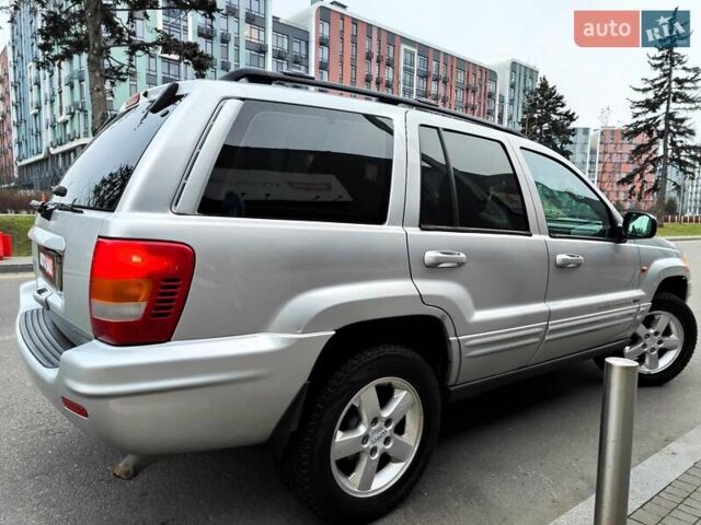 Сірий Джип Grand Cherokee, об'ємом двигуна 2.7 л та пробігом 387 тис. км за 6990 $, фото 18 на Automoto.ua
