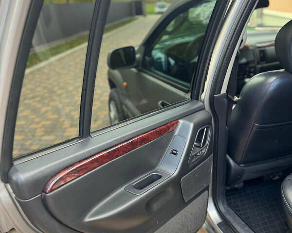 Джип Гранд Чероки 2002 в Сторожинце на Automoto.ua Серый Джип Гранд Чероки, объемом двигателя 2.69 л и пробегом 248 тыс. км за 8990 $, фото 15 на Automoto.ua