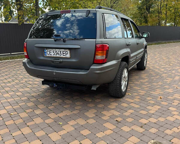 Джип Гранд Чероки 2002 в Сторожинце на Automoto.ua Серый Джип Гранд Чероки, объемом двигателя 2.69 л и пробегом 248 тыс. км за 8990 $, фото 2 на Automoto.ua