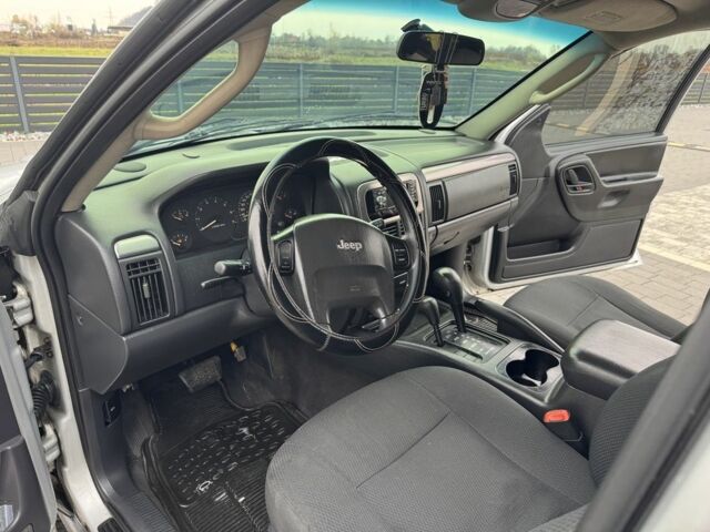 Серый Джип Гранд Чероки, объемом двигателя 4 л и пробегом 220 тыс. км за 6800 $, фото 4 на Automoto.ua