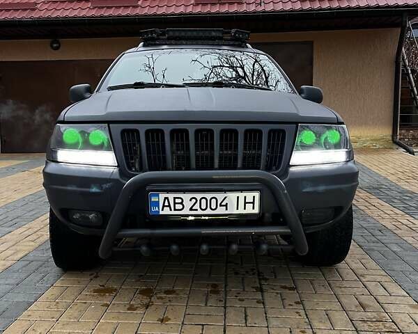 Сірий Джип Grand Cherokee, об'ємом двигуна 2.69 л та пробігом 359 тис. км за 11000 $, фото 6 на Automoto.ua