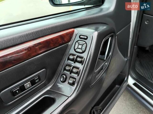 Сірий Джип Grand Cherokee, об'ємом двигуна 2.7 л та пробігом 387 тис. км за 6990 $, фото 27 на Automoto.ua