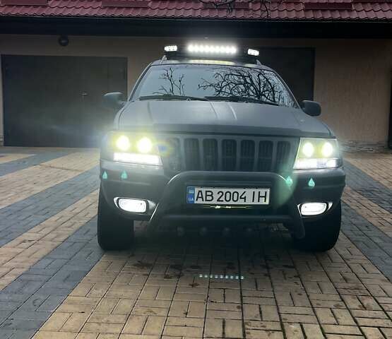 Сірий Джип Grand Cherokee, об'ємом двигуна 2.69 л та пробігом 359 тис. км за 11000 $, фото 1 на Automoto.ua