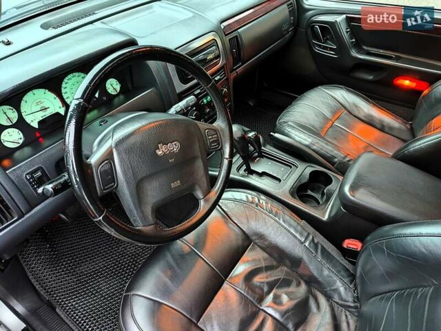 Сірий Джип Grand Cherokee, об'ємом двигуна 2.7 л та пробігом 387 тис. км за 6990 $, фото 28 на Automoto.ua