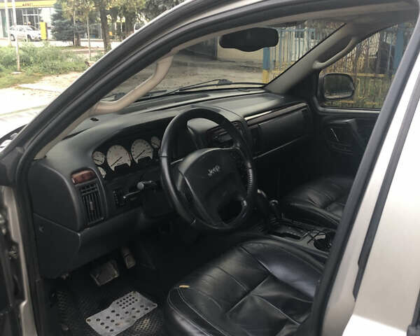 Серый Джип Гранд Чероки, объемом двигателя 2.69 л и пробегом 441 тыс. км за 9100 $, фото 6 на Automoto.ua