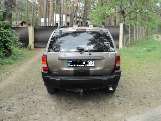 Сірий Джип Grand Cherokee, об'ємом двигуна 2.7 л та пробігом 300 тис. км за 3500 $, фото 3 на Automoto.ua