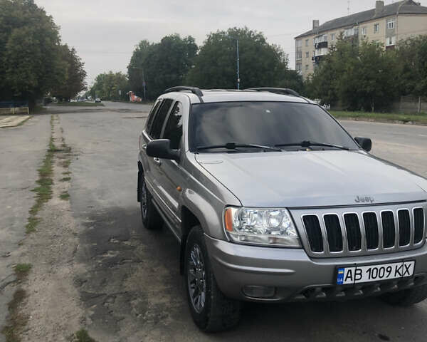 Серый Джип Гранд Чероки, объемом двигателя 2.69 л и пробегом 441 тыс. км за 9100 $, фото 2 на Automoto.ua