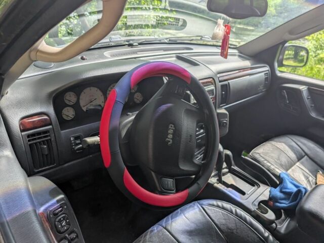 Сірий Джип Grand Cherokee, об'ємом двигуна 2.7 л та пробігом 311 тис. км за 6011 $, фото 6 на Automoto.ua